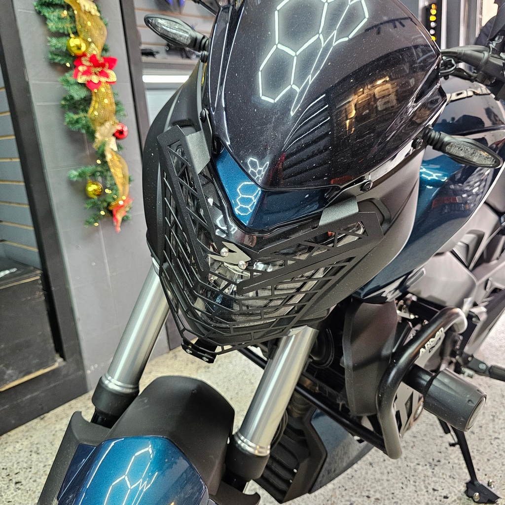 [268] PROTECTOR DE FAROLA BAJAJ DOMINAR 250/400 UG (ACERO)