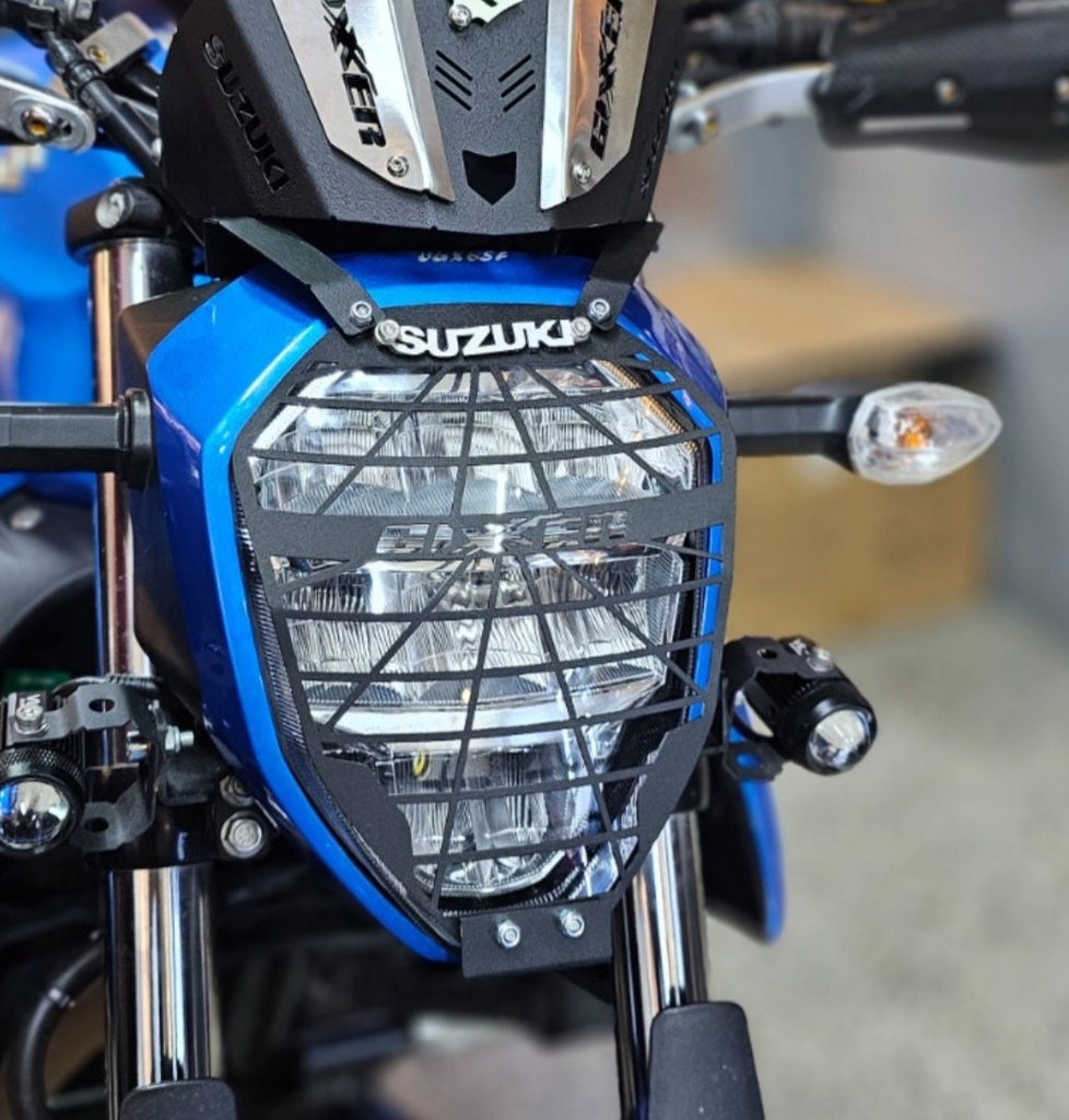 [271] PROTECTOR DE FAROLA SUZUKI GIXXER 150 FI/250 FI (ACERO)