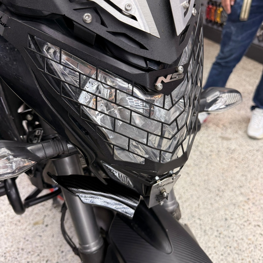 [272] PROTECTOR DE FAROLA BAJAJ PULSAR NS 200/160/150/125 UG (ACERO)