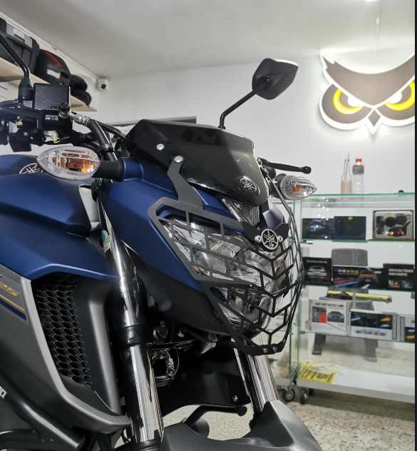 [475] PROTECTOR DE FAROLA YAMAHA FZ25 (ACERO)