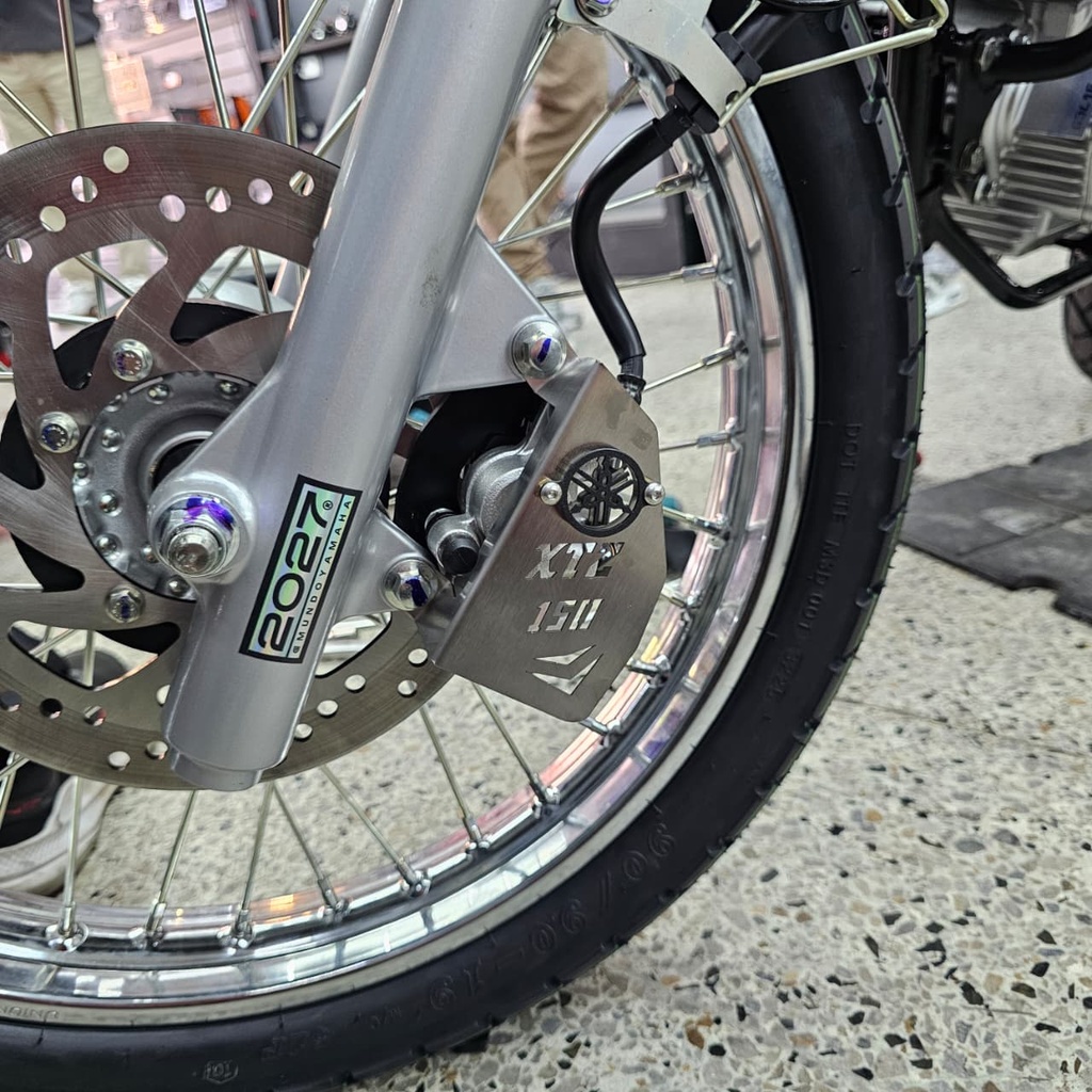 PROTECTOR DE CALIPER YAMAHA XTZ 150 (ACERO)